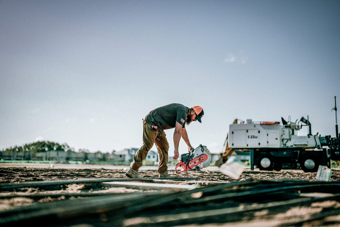 Construction worker wearing Wiley X Z87 rated safety glasses on an active jobsite