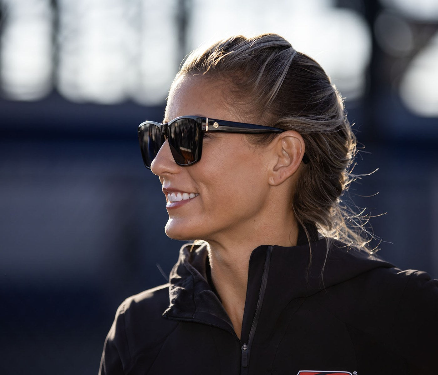Woman wearing black sunglasses outdoors