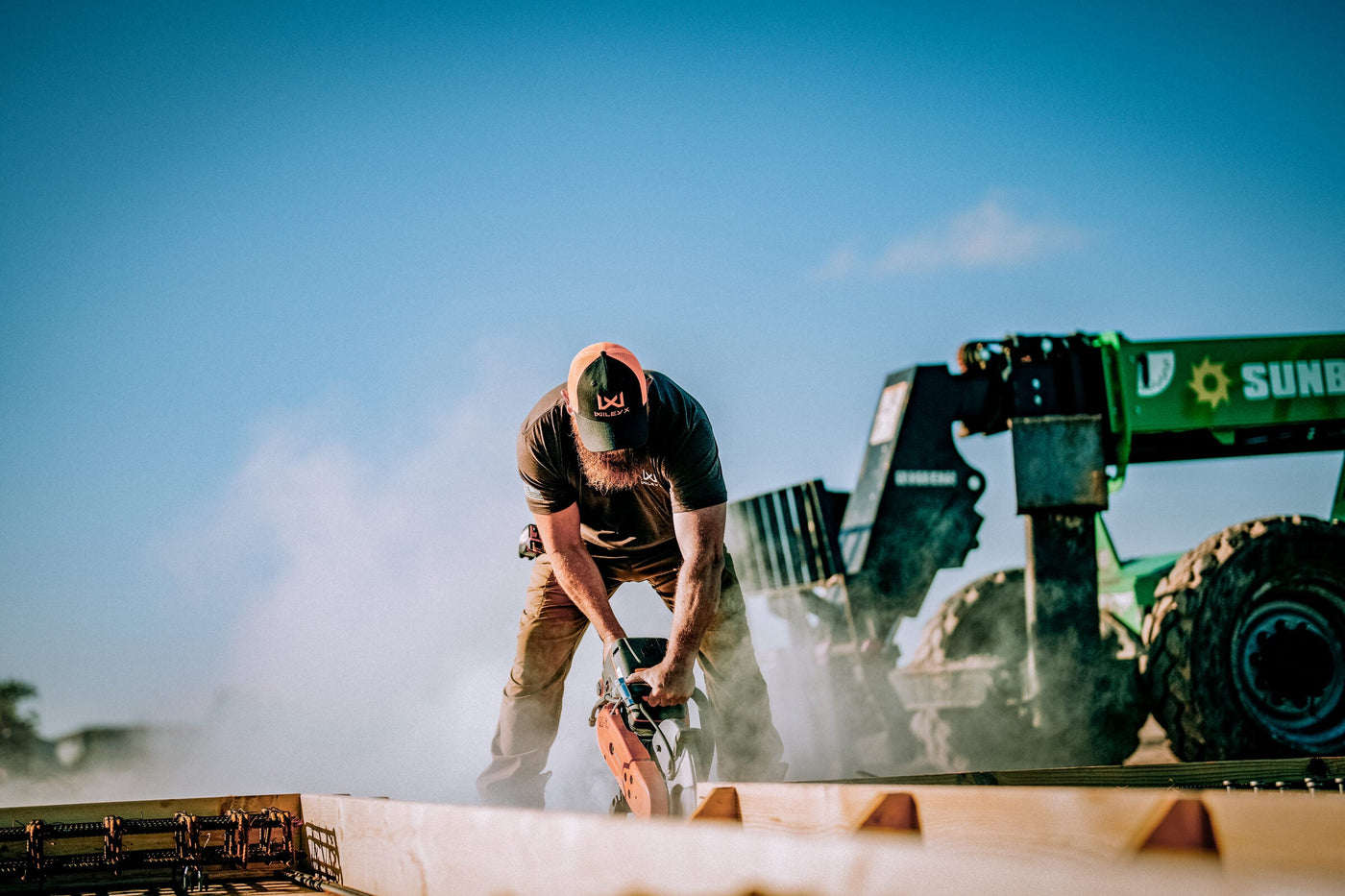 Construction worker wearing Wiley X Z87+ safety glasses on an active jobsite
