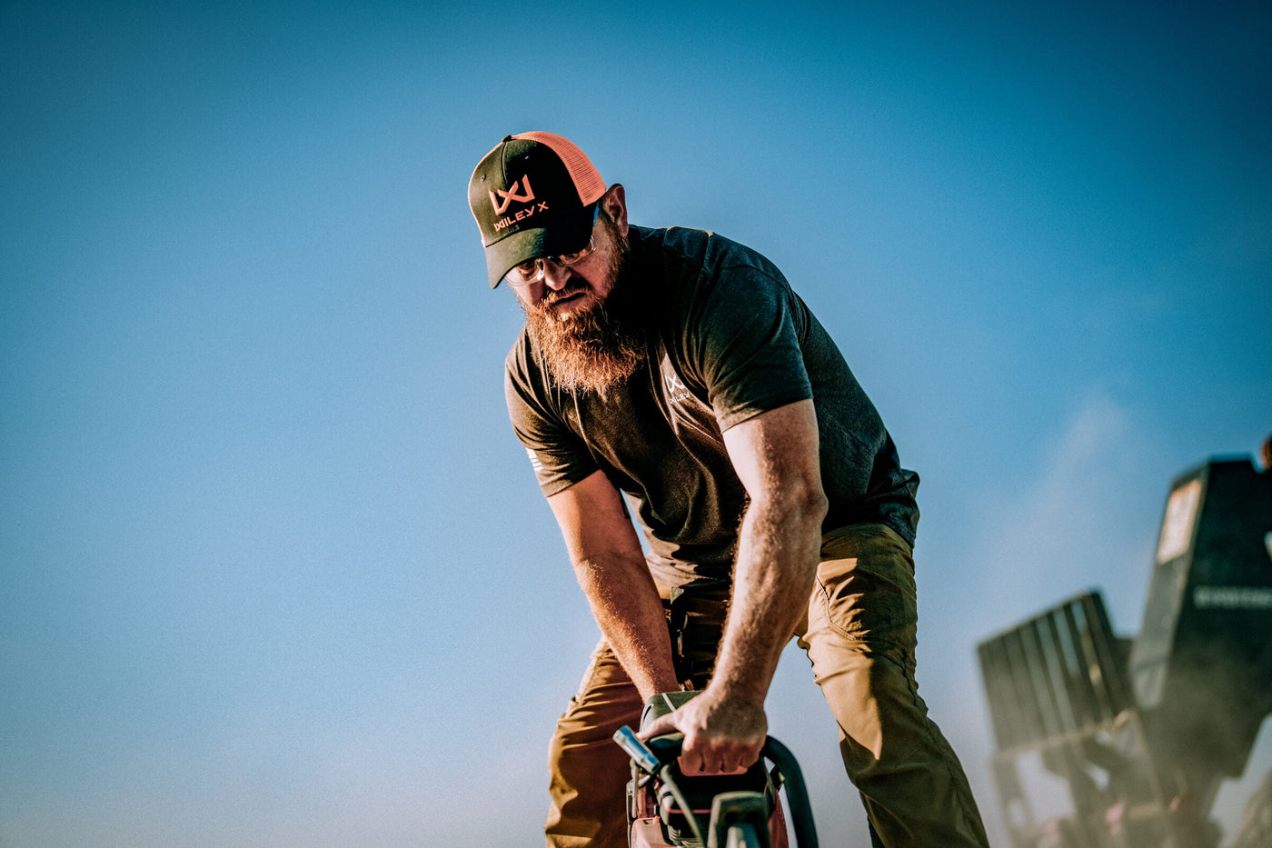 Construction worker wearing Z87-rated Wiley X safety glasses on an active jobsite
