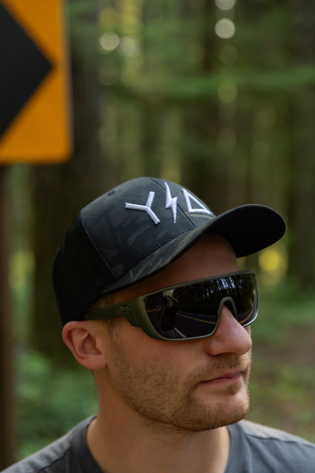 Close-up of Wye Delta Conductors Z87 polarized safety sunglasses worn outdoors