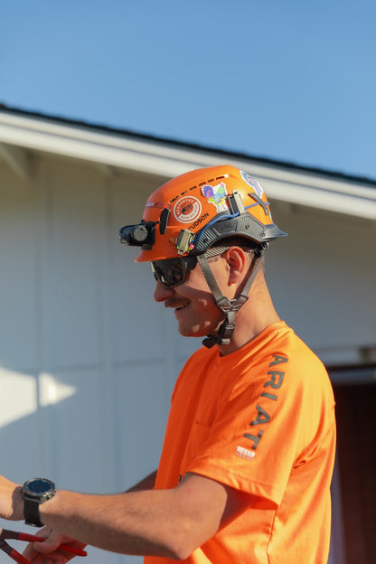 Utility worker wearing Wye Delta Conductors Z87 sunglasses on the job